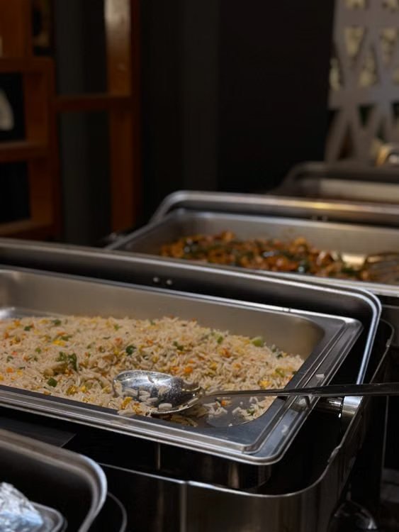 Vegetarian buffet service in chafing dishes
